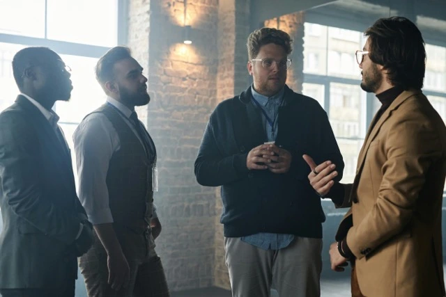 group of businessmen talking
