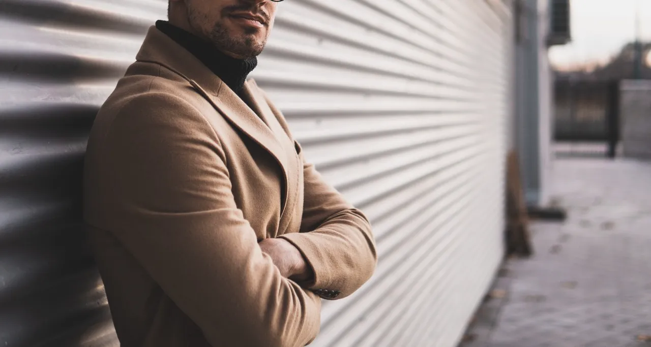 man with crossed arms